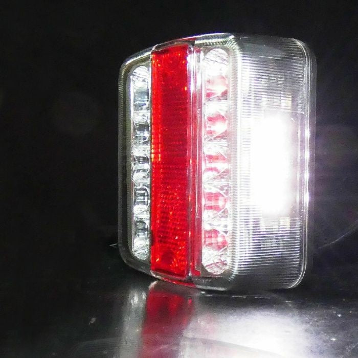 Един брой универсален LED ЛЕД Диоден стоп задна светлина с 4 функции за ремарке камион караванa платформа и др.12V с крушки 106 x 197 мм. Е-Мark Е4