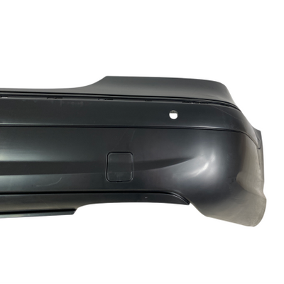 Тунинг броня задна за  Mercedes W211 E-Class (2002-2009) - AMG Design с отвори за парктроник